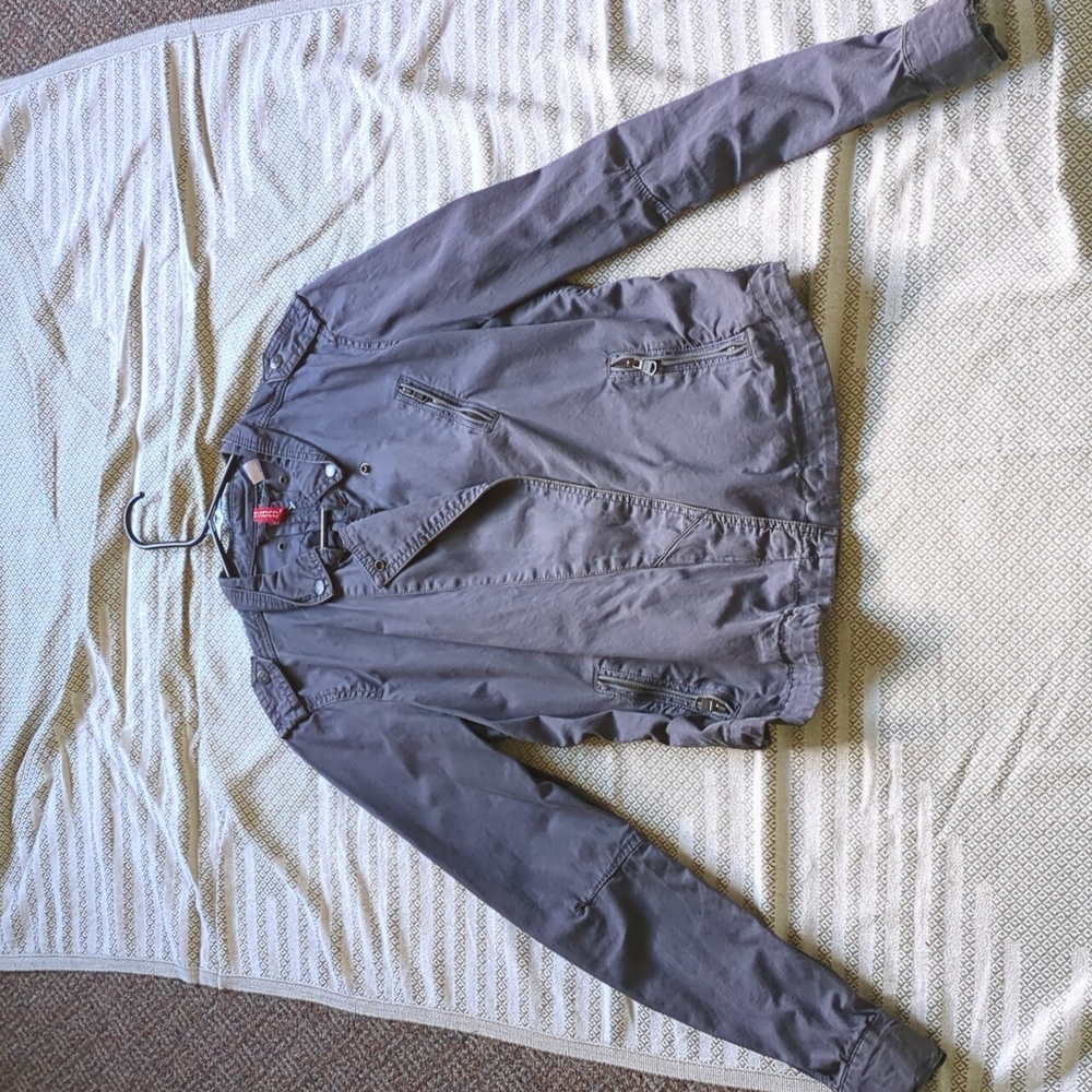 Grey jacket.